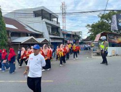 Satlantas Polres Majene Kawal Kegiatan Jalan Santai Dalam Rangka Reuni SMA Negeri 1 Majene